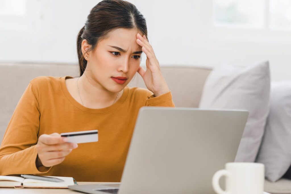 With the threat of a recession looming, should you increase your savings or eliminate your debt?